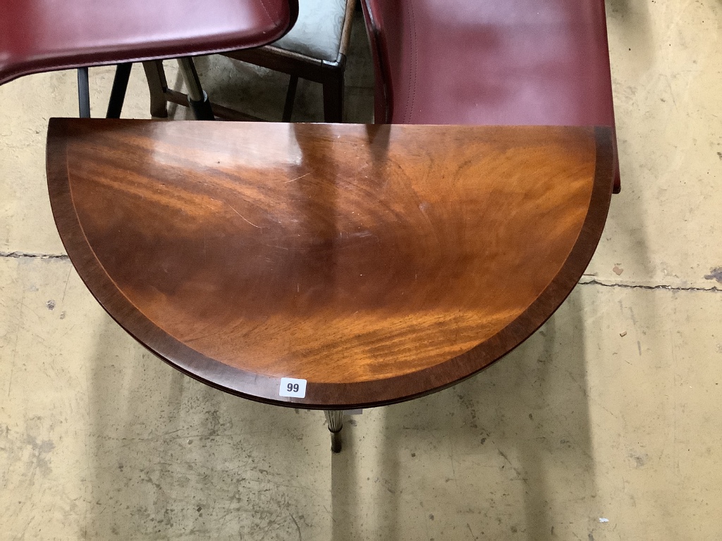 A reproduction mahogany D shape folding tea table, width 79cm, depth 39cm, height 73cm